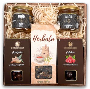Kosz prezentowy z herbatą, słodkościami i miodem