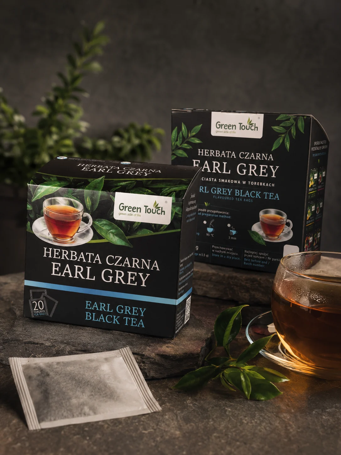 Green Touch - opakowanie Earl Grey z przodu i z tyłu, filtry i szklanka naparu.